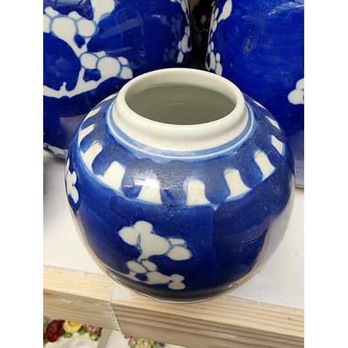 1129 - Fourteen Chinese blue and white ginger jars and eight covers, largest 14.5cm high.