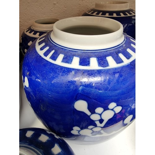 1129 - Fourteen Chinese blue and white ginger jars and eight covers, largest 14.5cm high.