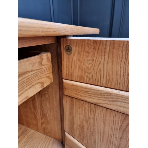 1011 - Two Ercol 'Saville' ash side cabinets, in the Arts & Crafts style, one with glazed superstructur... 