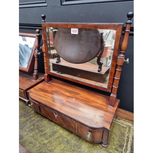 1015 - Three mahogany toilet mirrors, one with bone knobs, largest 52.5cm wide. 