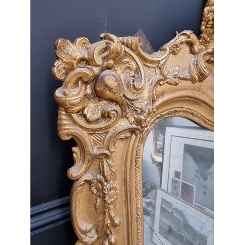 1023 - A large 19th century giltwood framed pier mirror, 174.5 high x 69cm wide, (plate a.f.).... 