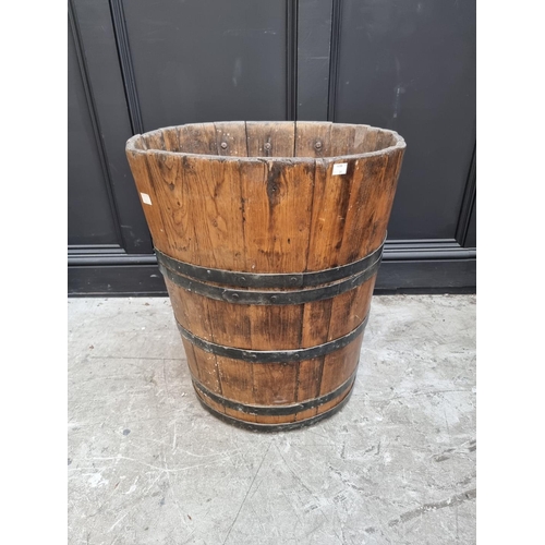 1025 - A large coopered pine grape hod, 64cm high x 54cm wide.