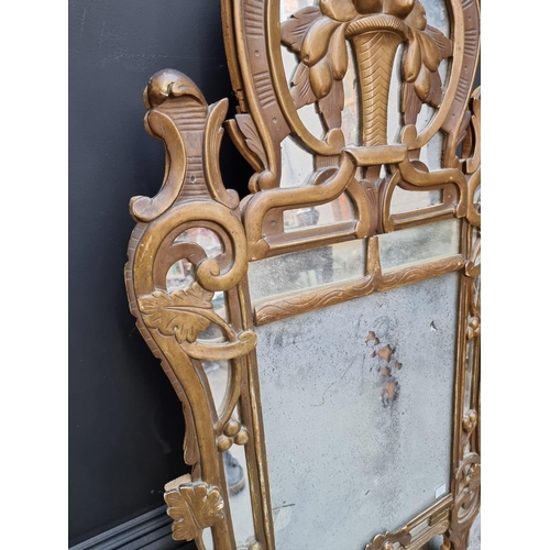 1026 - A late 18th century French gilt framed wall mirror, 107.5cm x 55cm.