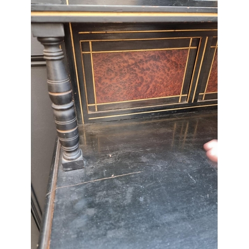 1041 - An interesting Aesthetic ebonized burr yew and parcel gilt side cabinet, possibly attributable to He... 
