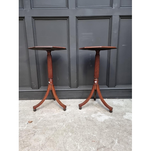 1056 - A pair of Regency style mahogany octagonal tripod tables, 42.5cm wide. 