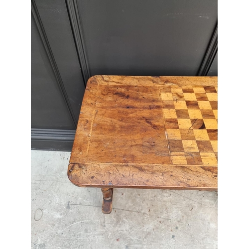 1057 - A Victorian walnut and chequerboard inlaid rectangular table, 80cm wide. 