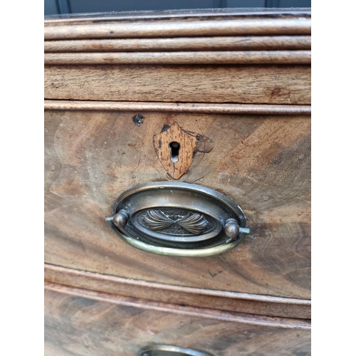 1058 - An early 19th century figured mahogany bowfront chest of drawers, 107.5cm wide. ... 