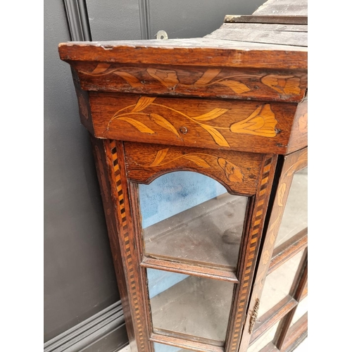 1060 - An 18th century Dutch marquetry bookcase section, 102.5cm high x 109cm wide.