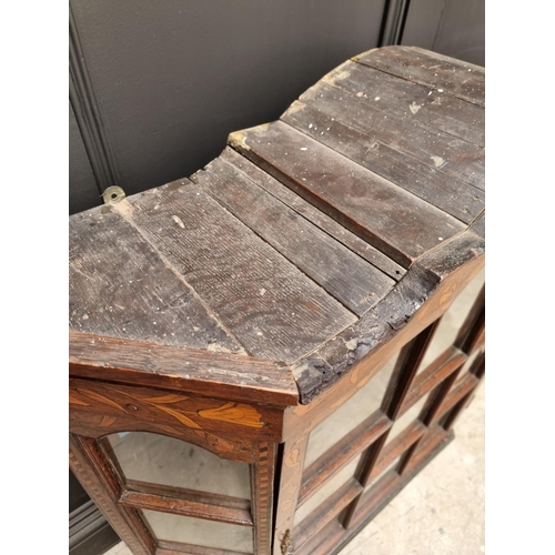 1060 - An 18th century Dutch marquetry bookcase section, 102.5cm high x 109cm wide.