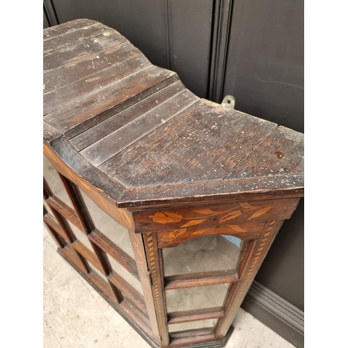 1060 - An 18th century Dutch marquetry bookcase section, 102.5cm high x 109cm wide.