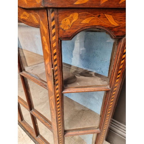 1060 - An 18th century Dutch marquetry bookcase section, 102.5cm high x 109cm wide.