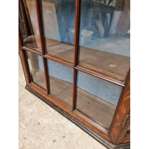 1060 - An 18th century Dutch marquetry bookcase section, 102.5cm high x 109cm wide.