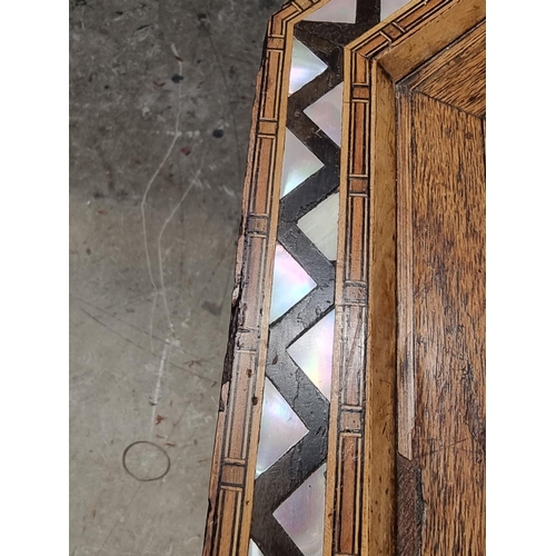 1064 - A Damascus marquetry and mother-of-pearl octagonal occasional table, with Islamic inscription, 46cm ... 