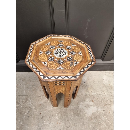 1064 - A Damascus marquetry and mother-of-pearl octagonal occasional table, with Islamic inscription, 46cm ... 