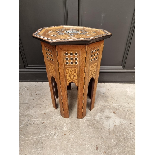 1064 - A Damascus marquetry and mother-of-pearl octagonal occasional table, with Islamic inscription, 46cm ... 