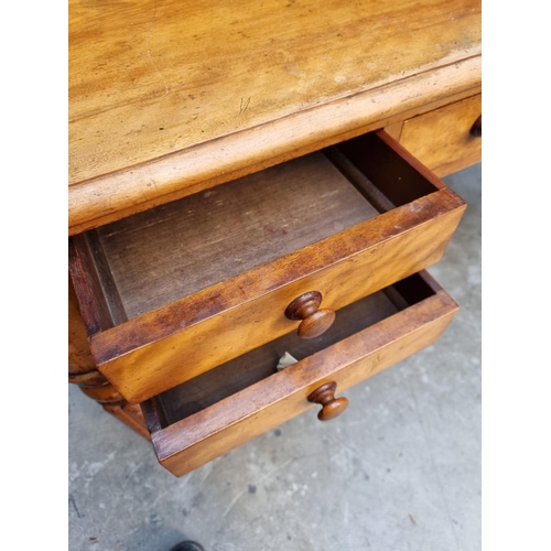 1071 - A Victorian mahogany desk, on reeded legs, 121cm wide.