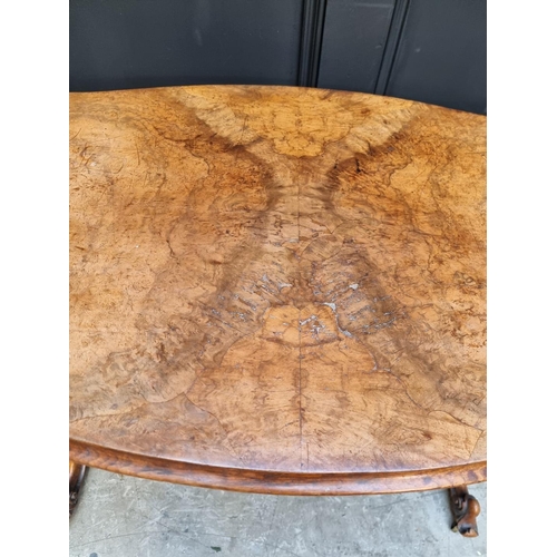 1072 - A Victorian figured walnut occasional table, of shaped outline, 108.5cm wide. 