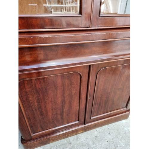 1075 - A Victorian mahogany bookcase, 110cm wide.