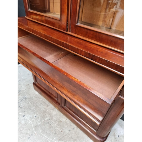 1075 - A Victorian mahogany bookcase, 110cm wide.