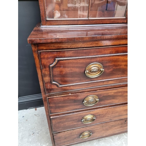 1076 - An early 19th century mahogany secretaire bookcase, 123cm wide.