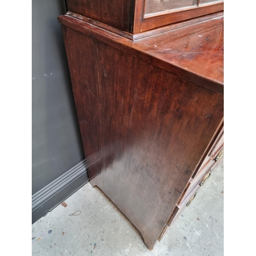 1076 - An early 19th century mahogany secretaire bookcase, 123cm wide.