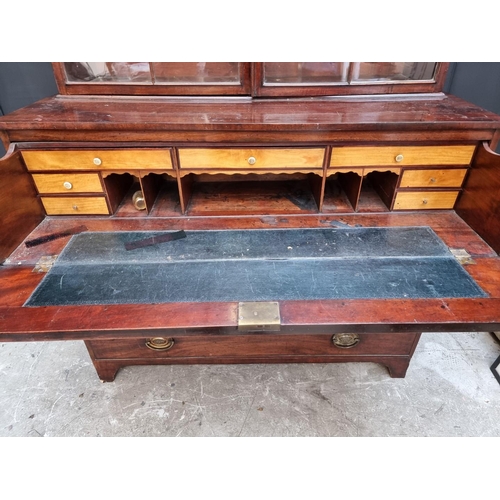 1076 - An early 19th century mahogany secretaire bookcase, 123cm wide.