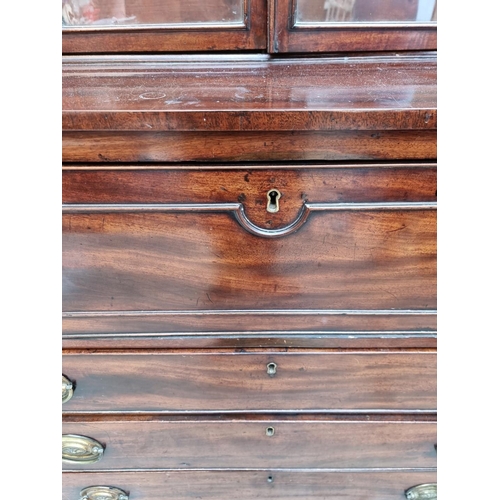 1076 - An early 19th century mahogany secretaire bookcase, 123cm wide.