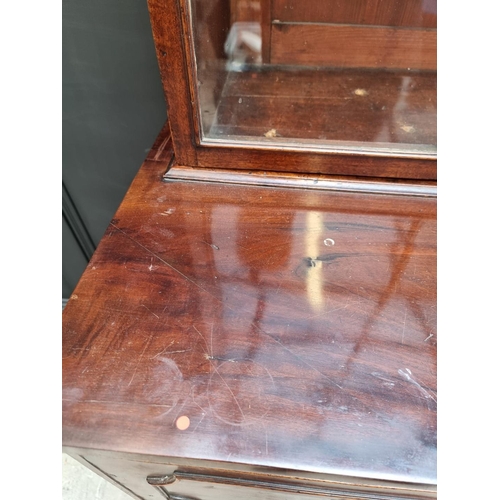 1076 - An early 19th century mahogany secretaire bookcase, 123cm wide.