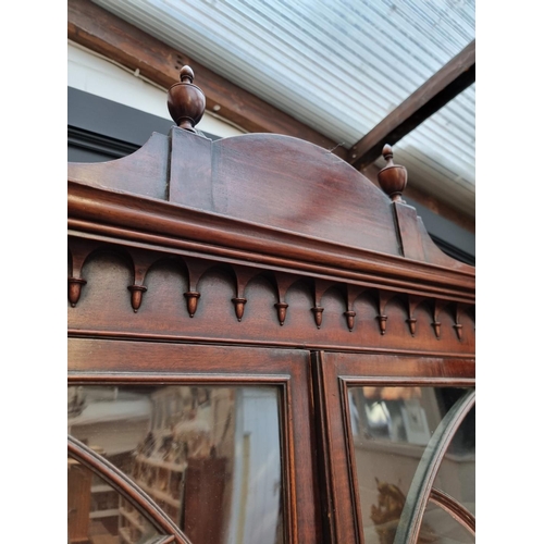 1076 - An early 19th century mahogany secretaire bookcase, 123cm wide.