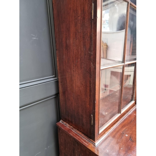 1076 - An early 19th century mahogany secretaire bookcase, 123cm wide.