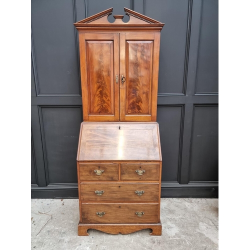 1078 - A George III mahogany bureau bookcase, (top and base associated), 78cm wide. 