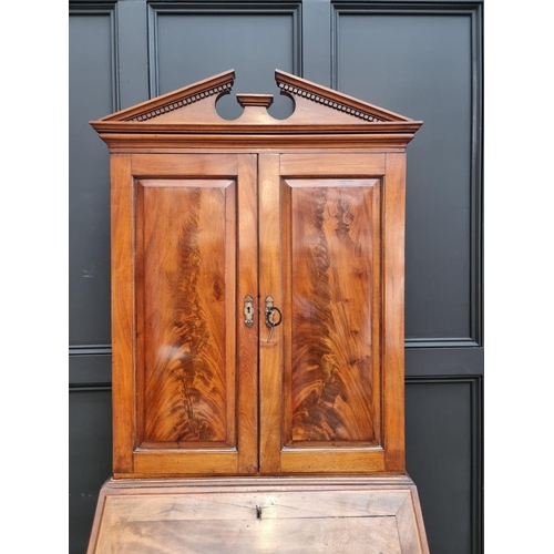 1078 - A George III mahogany bureau bookcase, (top and base associated), 78cm wide. 