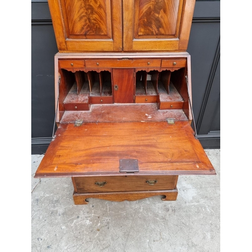 1078 - A George III mahogany bureau bookcase, (top and base associated), 78cm wide. 