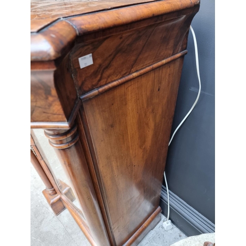 1079 - A Victorian walnut credenza, 181.5cm.