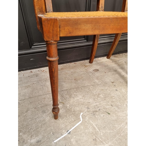 1089 - A pair of early 19th century beech and cane open armchairs, possibly Scandinavian.