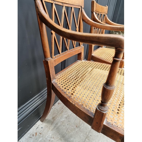 1089 - A pair of early 19th century beech and cane open armchairs, possibly Scandinavian.