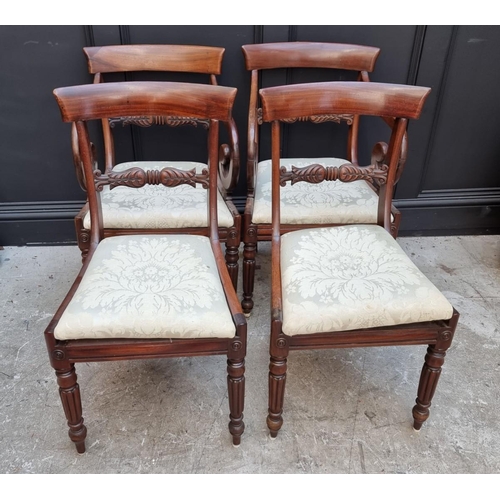 1093 - A set of four George IV mahogany bar back dining chairs, to include a pair of elbow chairs. ... 