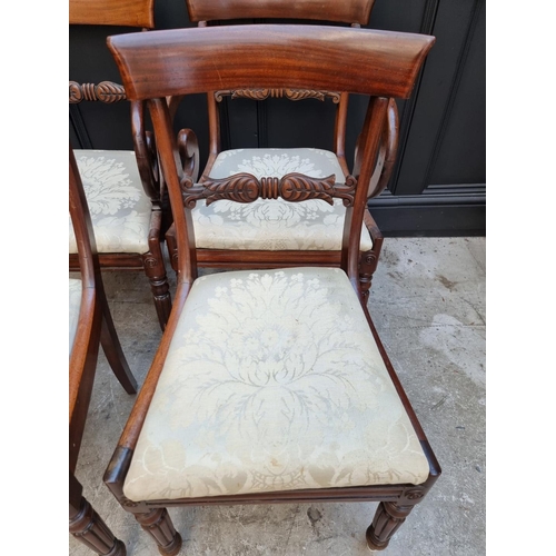 1093 - A set of four George IV mahogany bar back dining chairs, to include a pair of elbow chairs. ... 