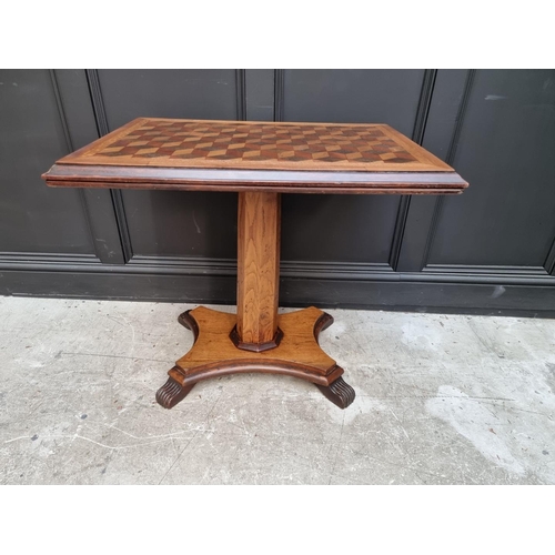 1107 - An oak and parquetry rectangular pedestal table, 83.5cm wide. 