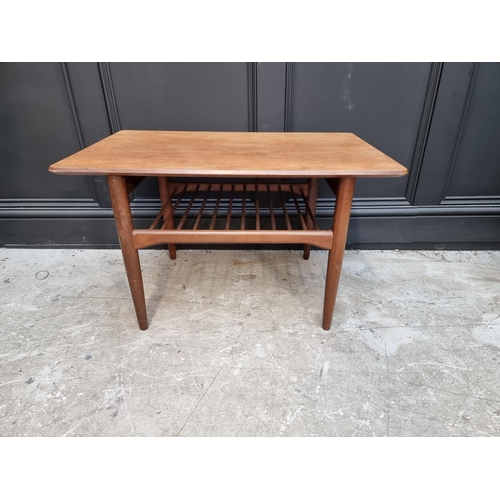 1109 - A G Plan rectangular low occasional table, with spindle undertier, 76cm wide.