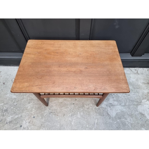 1109 - A G Plan rectangular low occasional table, with spindle undertier, 76cm wide.