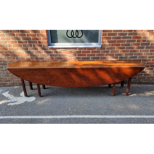 1111 - A large Irish mahogany wake table, 287cm x 128cm.