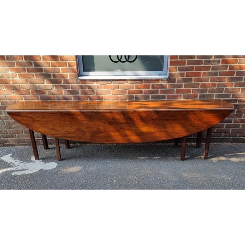 1111 - A large Irish mahogany wake table, 287cm x 128cm.