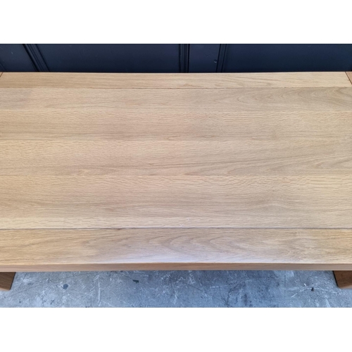 1112 - A contemporary pale oak rectangular low occasional table, 125cm long.