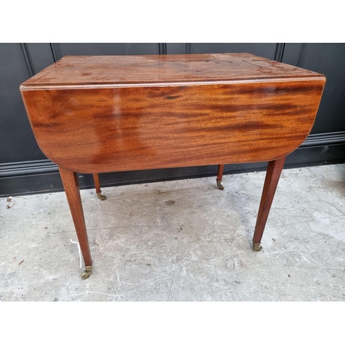 1115 - A George III mahogany and line inlaid Pembroke table, 96cm wide when open. 