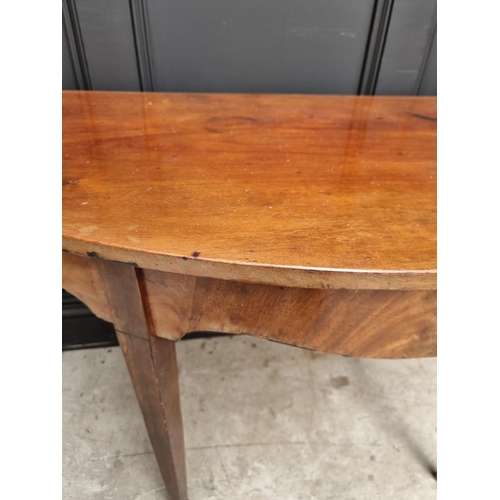 1116 - A early 19th century demi-lune console table, 124cm wide.