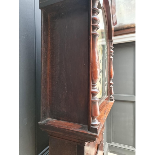 1118 - A 19th century oak, mahogany and inlaid eight day longcase clock, the 14in arched painted dial inscr... 