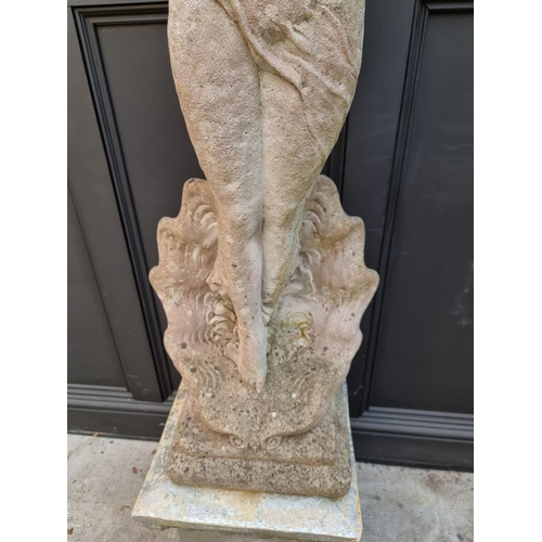 1135 - A large weathered composition stone figure of Venus, 110cm high, on pedestal base, total height... 