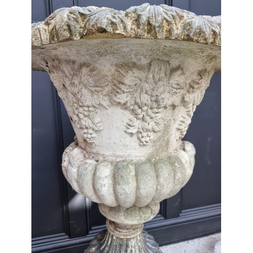 1145 - An old weathered pottery or composition stone Campana urn and pedestal, 111cm high, (s.d.).... 