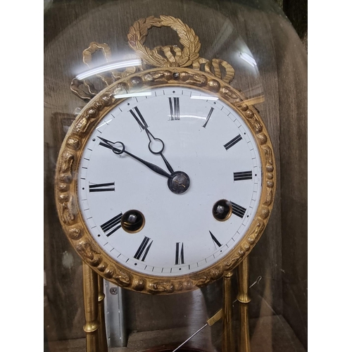 1362 - A brass mantel clock, striking on a bell, with glass dome, total height 27cm.